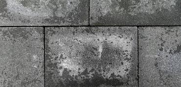 Witte vlekken op je tuintegels? Wat is het?